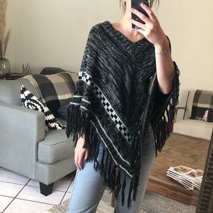 Stylish poncho is neutral tones! 🖤